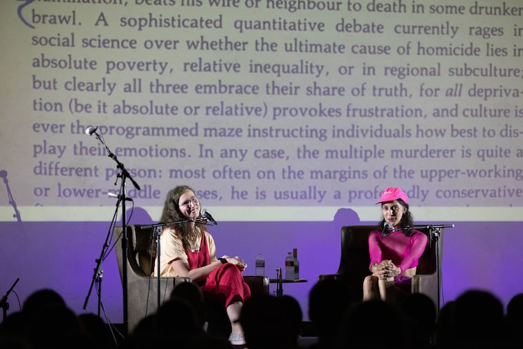 "You're Wrong About" podcast host Sarah Marshall (left) and comedian Jamie Loftus taping a live show at Hollywood Forever in Los Angeles in September 2022.