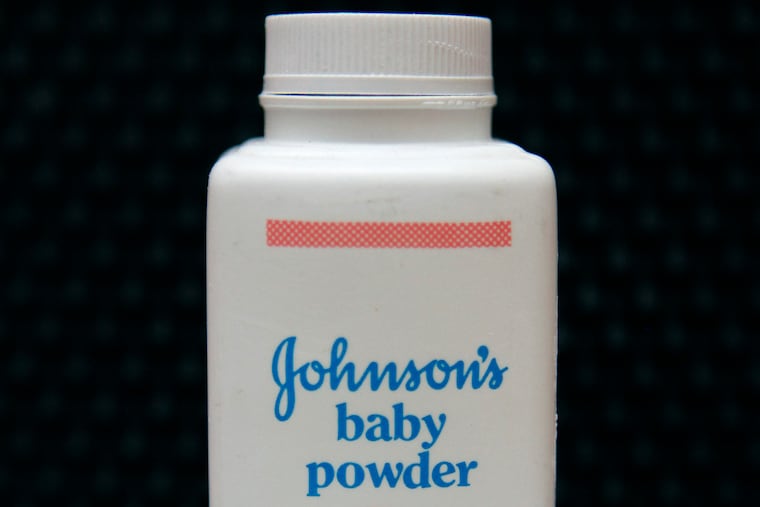 FILE - In this April 15, 2011 file photo, a bottle of Johnson's baby powder is displayed in San Francisco. Johnson & Johnson is pulling its iconic, talc-based Johnson’s Baby Powder from shelves worldwide next year in favor of a product based on cornstarch. The health care giant’s announcement Friday, Aug. 12, 2022, comes two years after it ended talc-based powder sales in the U.S. and Canada, where demand has dwindled amid thousands of lawsuits claiming it had caused cancer.