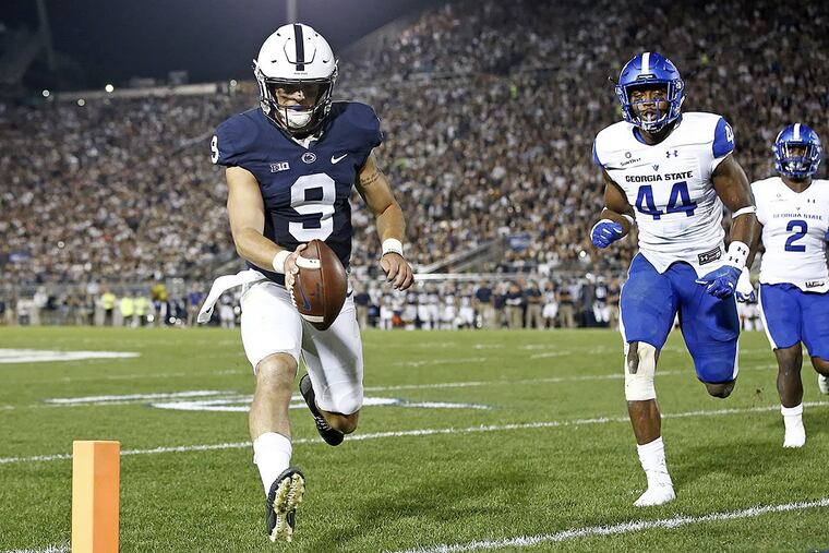 Penn State quarterback Trace McSorley (9) runs in for a touchdown against Georgia State during the first half of an NCAA college football game in State College, Pa., Saturday, Sept. 16, 2017.