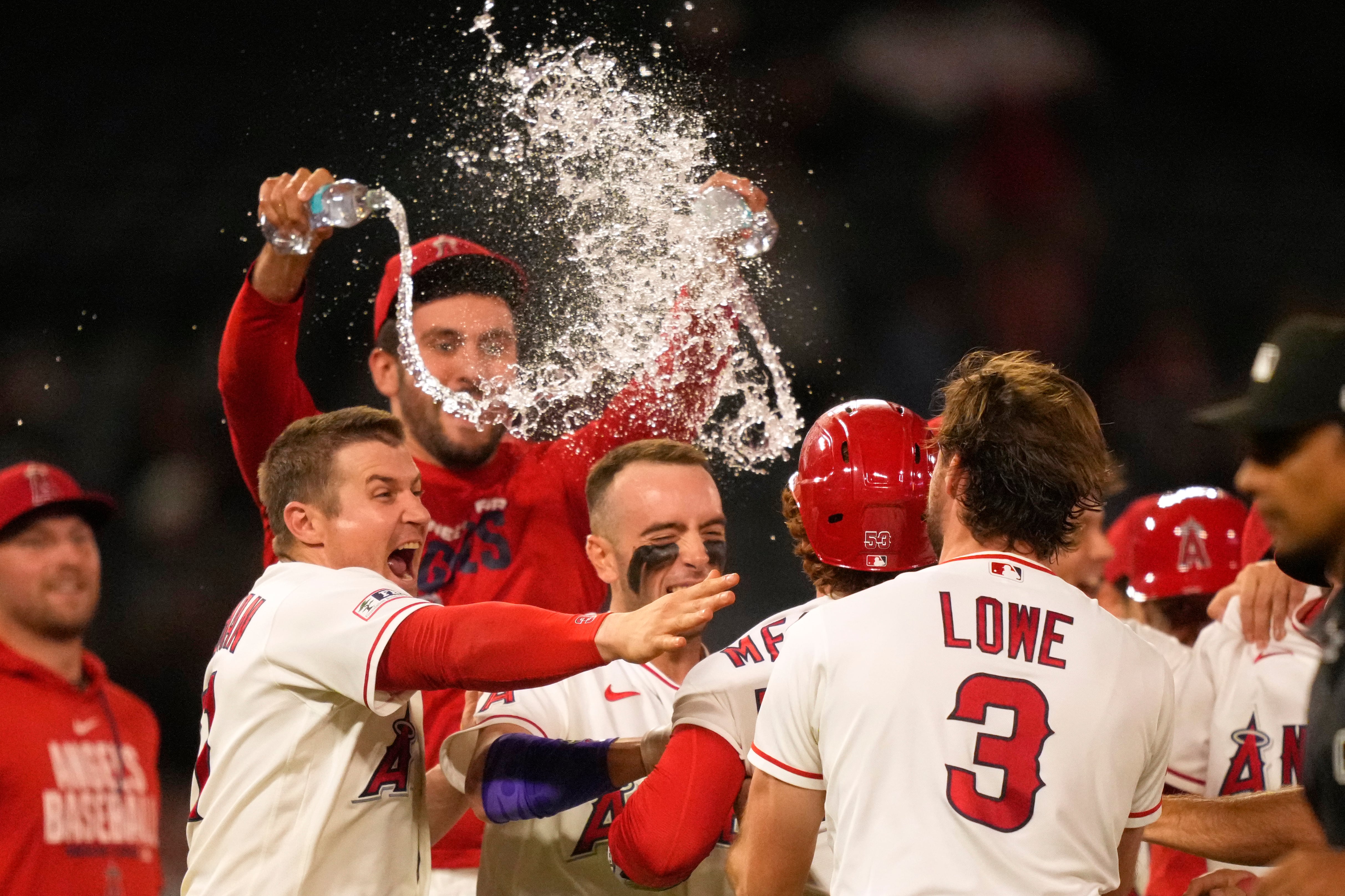 Angels blow 9th-inning lead, then rally for 2 in the 10th to edge Twins 5-4