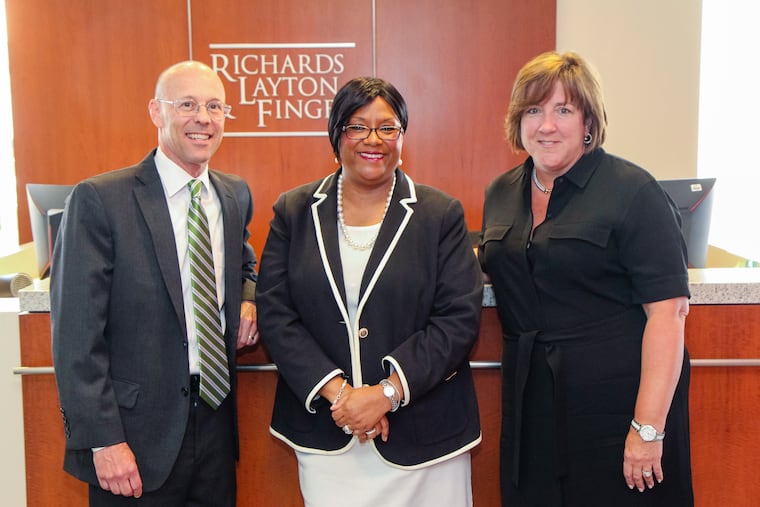 The new leadership at Delaware's largest law firm includes Doneen Keemer Damon (center); Paul M. Altman (left) and Lisa A. Schmidt.
