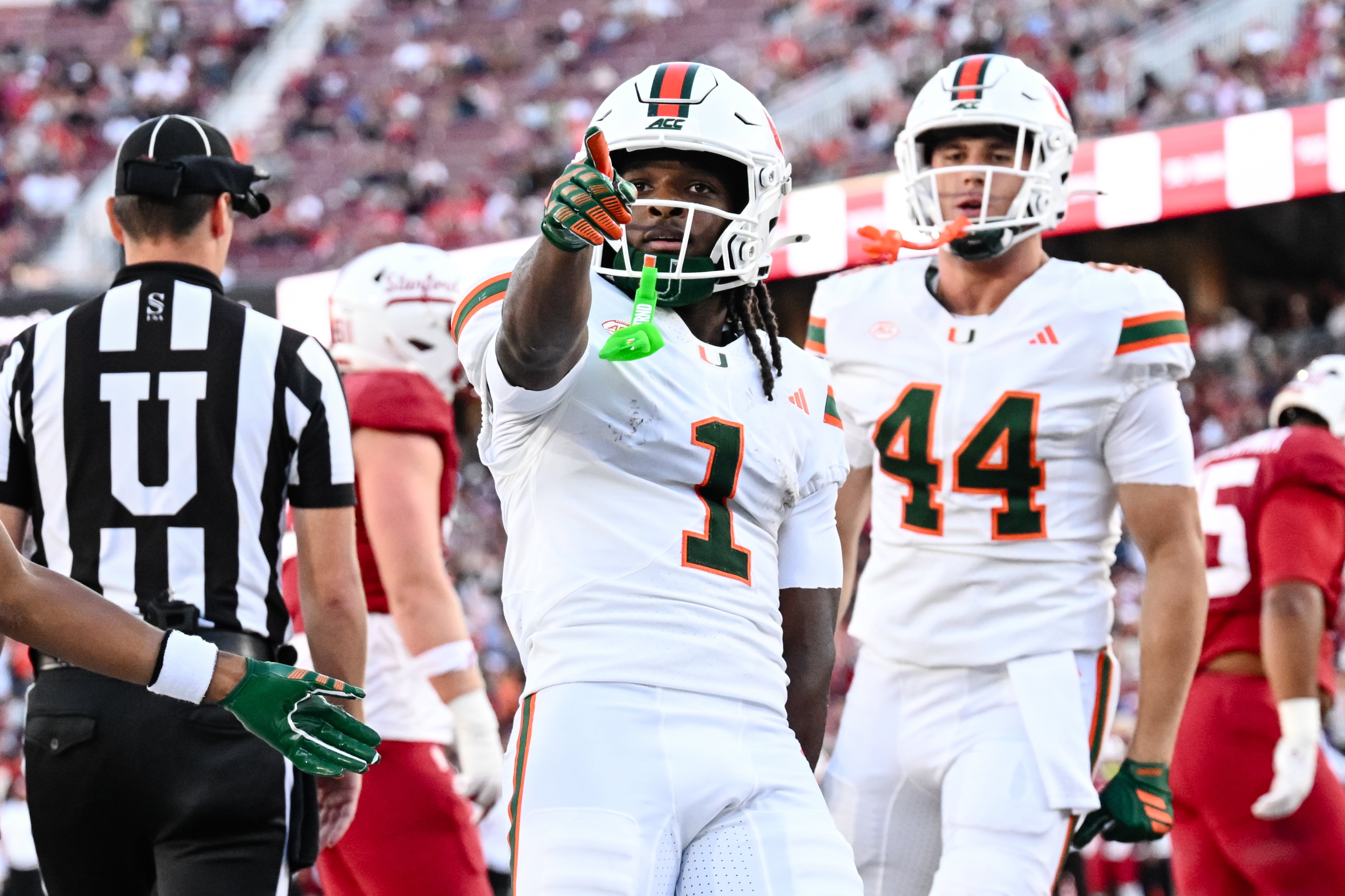 Mensah throws 5 TD passes, Toney sets record in No. 7 Miami's 45-6 win over Stanford