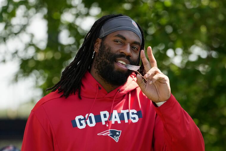 New England Patriots linebacker Matthew Judon walks onto the field during a joint practice with the Eagles on Tuesday.