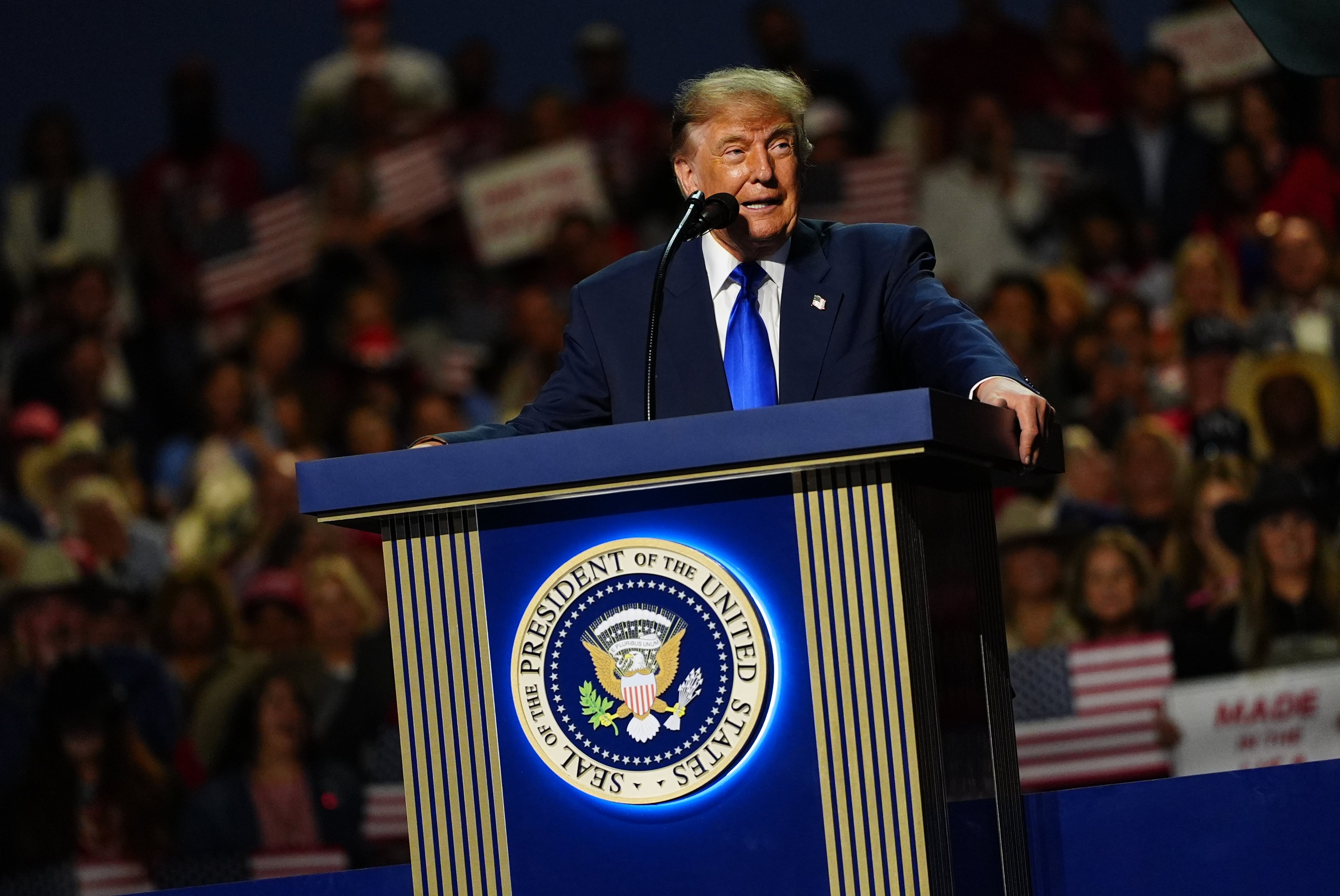 The Latest: Trump makes dubious pledge to give every US adult $5,000 if GOP wins midterm elections