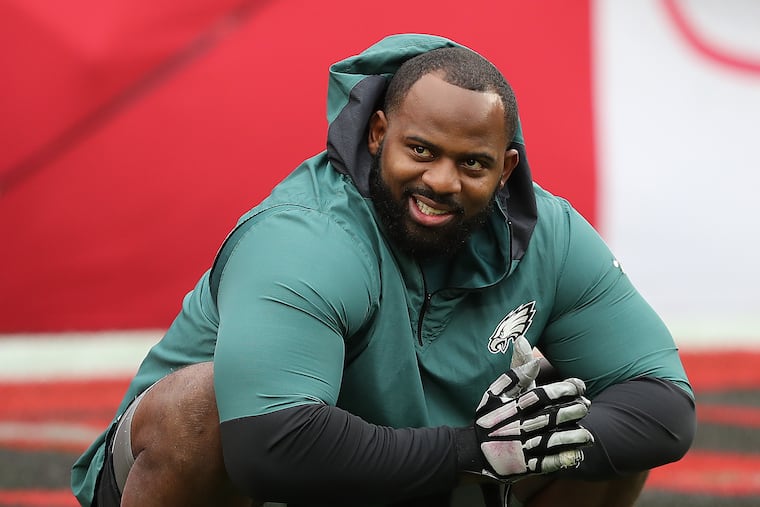 Philadelphia Eagles defensive tackle Fletcher Cox warms up before the Eagles play the Buccaneers at Raymond James Stadium in Tampa, Fla. on Sunday, Jan. 16, 2022.