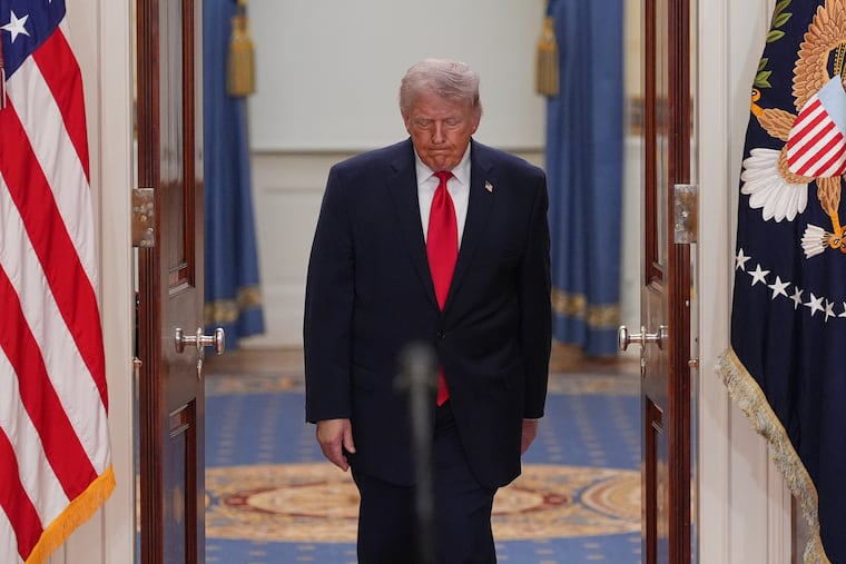 President Donald Trump arrives to speak about the Iran war from the Cross Hall of the White House on April 1.