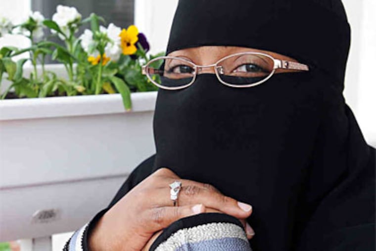Afeni Stones of East Falls has chosen to wear the niqab as a way of expressing her complete dedication to Islam. (Sharon Gekoski-Kimmel / Staff Photographer)