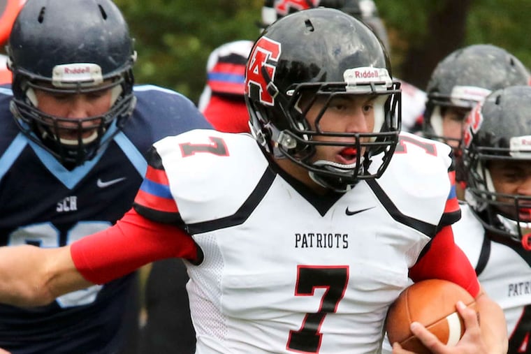 Germantown Academy's quarterback Kyle McCloskey (7) scrambles with the ball during their high school football game against Springside Chestnut Hill, Saturday, Oct. 17, 2015, in Philadelphia. Germantown Academy defeated Springside Chestnut Hill 21-12.