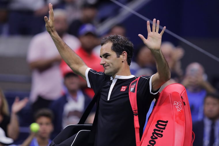 Roger Federer, of Switzerland, thanks the crowd after a loss to Grigor Dimitrov, of Bulgaria, during the quarterfinals of the U.S. Open tennis championships Tuesday, Sept. 3, 2019, in New York. Dimitrov won 3-6, 6-4, 6-3, 6-4, 6-2. (AP Photo/Charles Krupa)