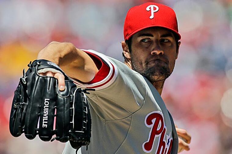 Cole Hamels, the face of a disappointing Phillies season almost one-third completed, refuses to admit frustration. (Alex Brandon/AP)