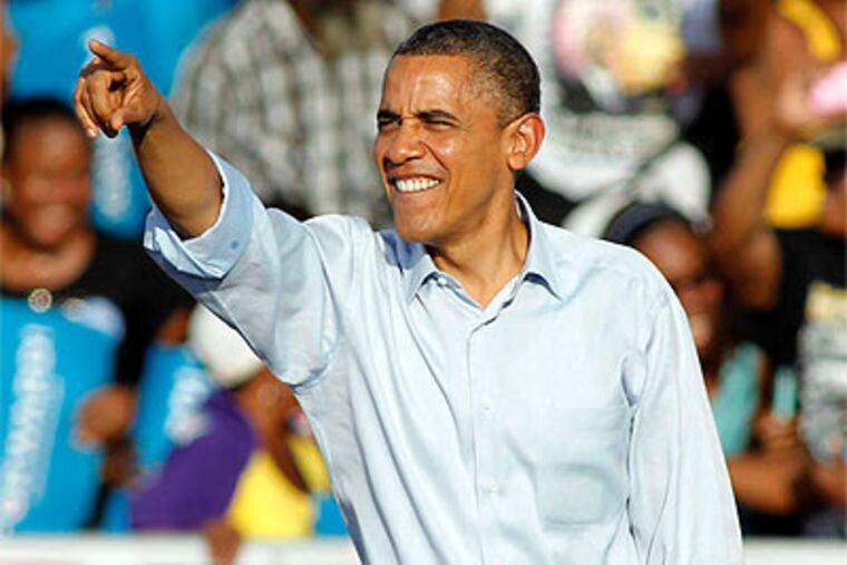 Is President Obama pointing ahead to four more years . . . or is he indicating the way back home to Chicago? (Associated Press)