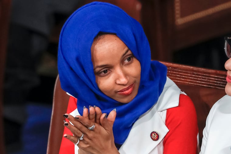 In this Feb. 5, 2019, file photo, Rep. Ilhan Omar, D-Minn., listens to President Donald Trump's State of the Union speech, at the Capitol in Washington.