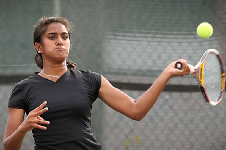 "There's a lot of pressure, but I think pressure can be a good thing or a bad thing," Dyuti Das says of playing for the Cherry Hill East girls' tennis team. (Jerry Lodriguss/Staff Photographer)
