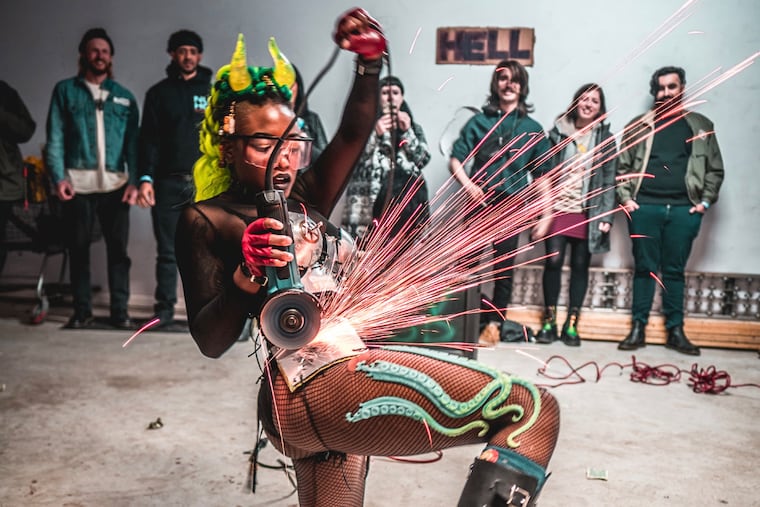 Performer Maki Roll sends sparks flying with a grinder act at a previous iteration of the World Oddities Expo, which moves into the Pennsylvania Convention Center on April 27th.