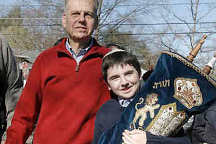 Lewis Cohen, 11, with grandfather Jeffrey Sorokin, had mixed feelings but was excited. (AKIRA SUWA / Staff Photographer)