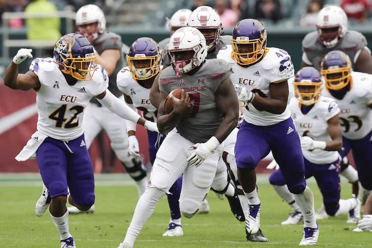 Temple running back Ryquell Armstead runs with football past East Carolina defenders on Saturday, October 6, 2018. YONG KIM / Staff Photographer