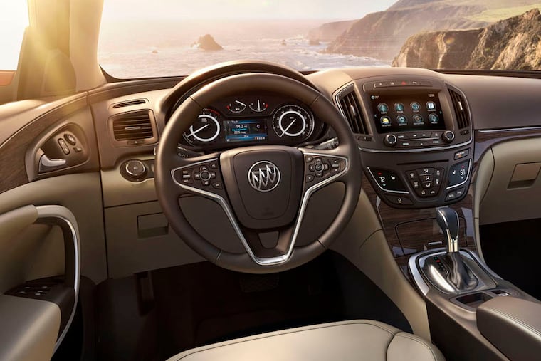 2015 Buick Regal with Light Neutral interior seating with Cocoa accents is offered with Soleil Keisel leather seats and Rhythm wood dacor.
A 2015 Buick Regal functions well as communications central, with great voice control of and wireless connectivity for favorite gadgets. And oh, yeah, it’s a good ride, too!