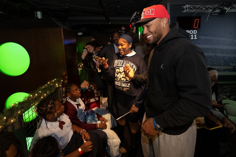 Eagles running back Saquon Barkley hosted a toy drive at Chickie’s & Pete’s in South Philadelphia on Monday.