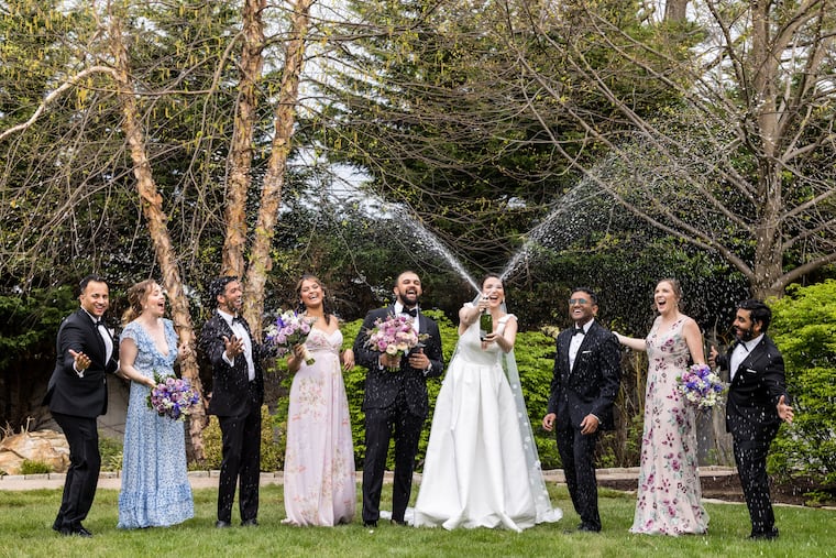 Colleen and Shreyas celebrate with their wedding party.
