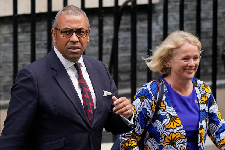 Britain's Foreign Secretary James Cleverly, left, and Vicky Ford, development minister in the Foreign Office leave 10 Downing Street in London on Wednesday after attending the first cabinet meeting since Liz Truss was installed as British Prime Minister a day earlier.