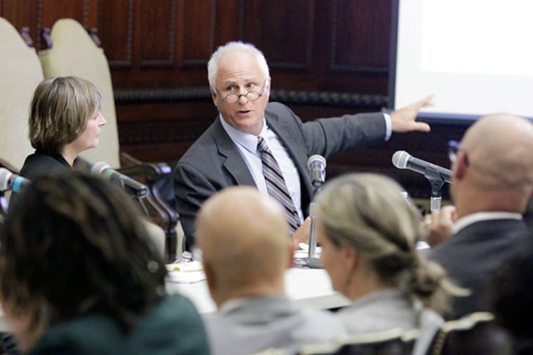 Sharon Ward, Exec. Dir. of the Pa. Budget and Policy Center, listens to David Sciarra, Exec. Dir. of the Education Law Center-NJ during a symposium on school funding at City Hall in Phila. October 9, 2013. ( ELIZABETH ROBERTSON / Staff Photographer )