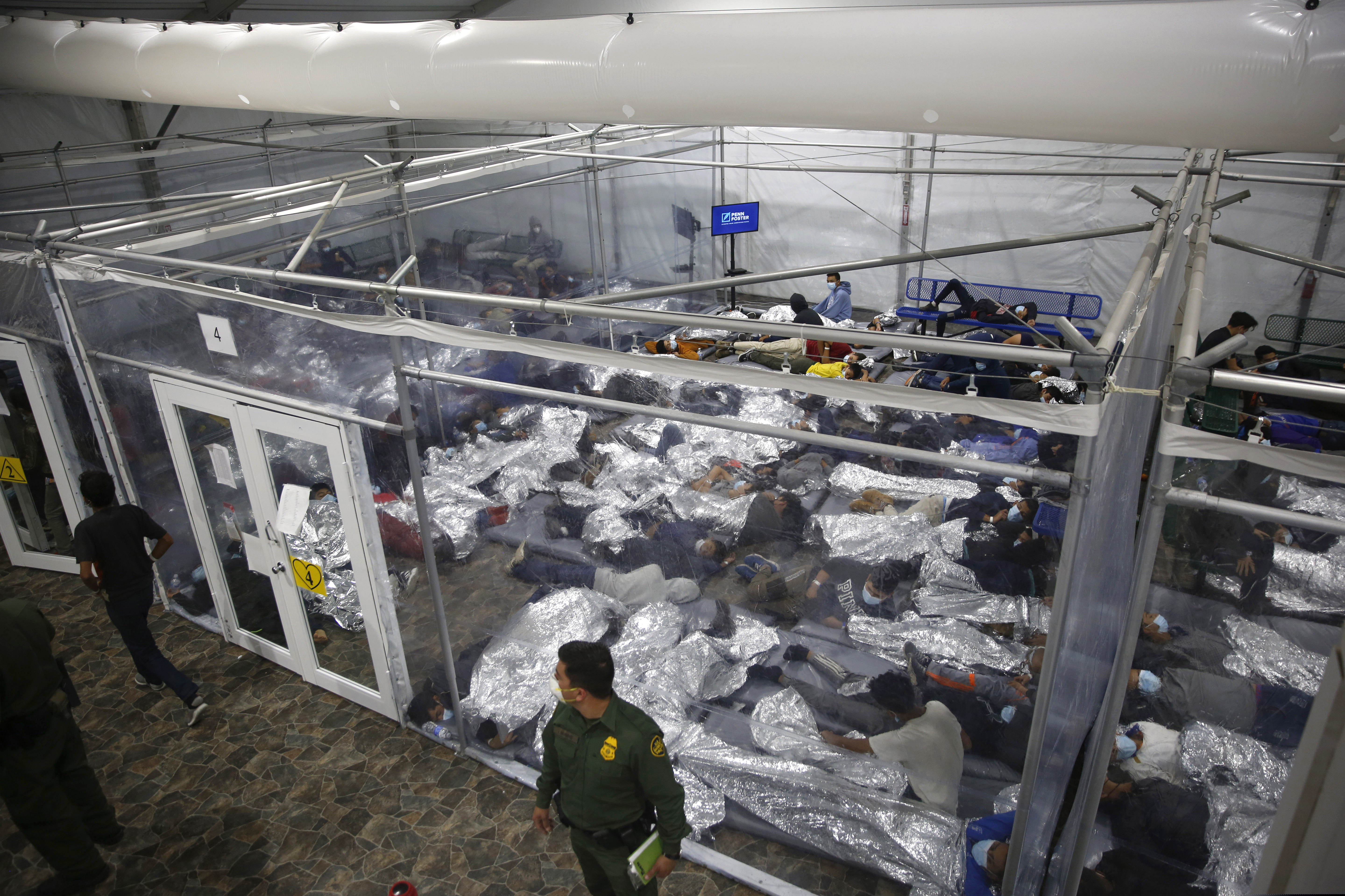 Young minors lie inside a pod last month at the Donna Department of Homeland Security holding facility, the main detention center for unaccompanied children in the Rio Grande Valley run by U.S. Customs and Border Protection (CBP), in Donna, Texas.