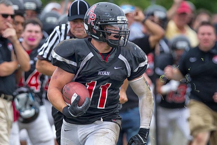Archbishop Ryan's John Liguori races down the sideline. (Ed Hille/Staff Photographer)