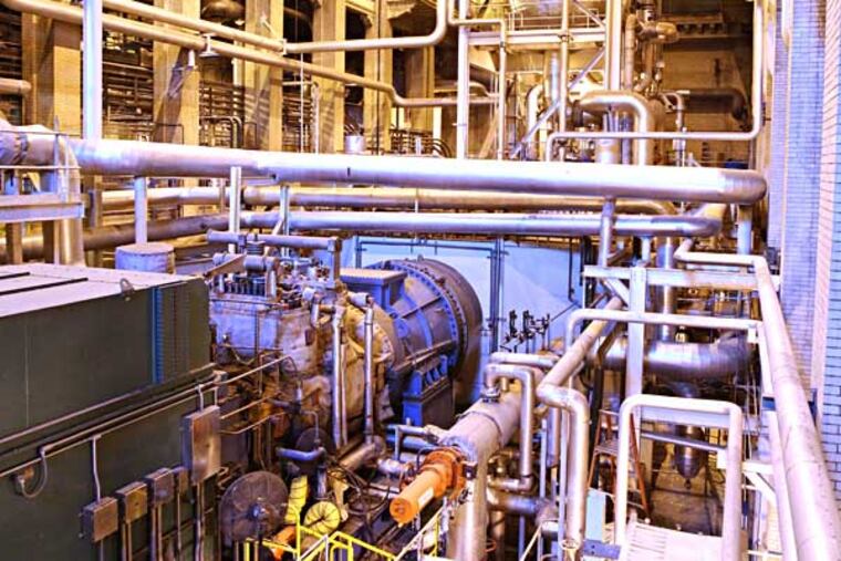 Veolia Energy, a French energy giant that quietly took over the steam loop in 2007, is upgrading and repositioning the system as an environmentally friendly energy source – “green steam.” The turbine hall with 54 megawatt steam turbine. This is not one of the new parts. ( Charles Fox / Staff Photographer )