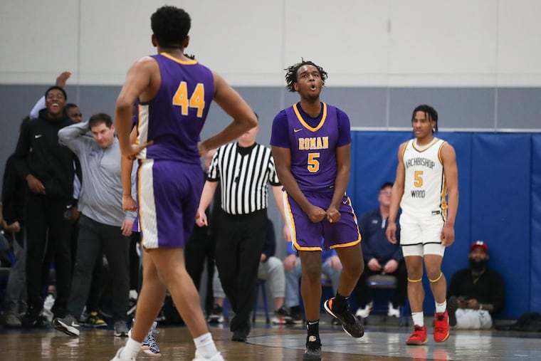 Roman Catholic’s Anthony Finkley celebrates after a dunk against Archbishop Wood in the PIAA 6A semifinal on Tuesday.