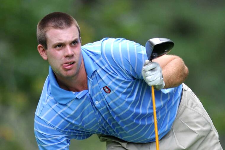 CORRECTS THE NAME OF PLAYER Defending champion Andrew Mason watches one of his tee shots split the fairway at famed Pine Valley Golf Club where the Golf Association of Philadelphia (GAP) is holding its 108th Open Championship on Monday, July 23, 2012. Mason, an amateur from Huntingdon Valley Country Club, was leading the tournament at 3-over par when play was halted due to a storm front coming through late in play. ( CLEM MURRAY / Staff Photographer )
