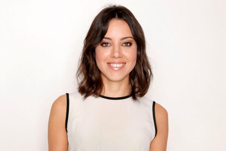 This Sunday, July 14, 2013 photo shows Aubrey Plaza from the cast of "The To Do List" at the Four Seasons Hotel in Los Angeles. The comedy revolves around a Boise teenager named Brandy Klark, played by Plaza, a valedictorian of the Class of 1993, who creates a "to do" list of the things she missed out on in high school. The film releases Friday, July 26, 2013. (Photo by Todd Williamson/Invision/AP)