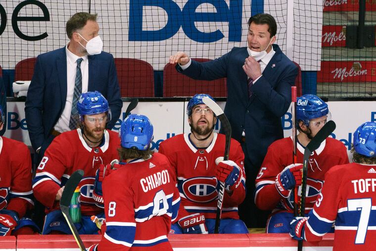 Montreal Canadiens replacement coach Luke Richardson (right) gives instructions during a break against the Vegas Golden Knights in Game 4. Montreal leads the heavily favored Golden Knights, three games to two, in the Stanley Cup semifinals.