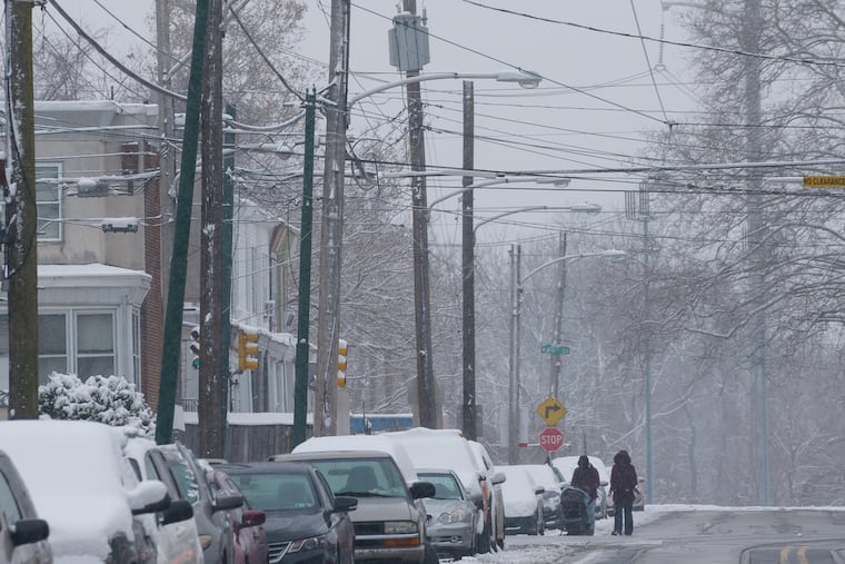 Snow falls on the 6500 block of Kingsessing Avenue in Philadelphia on March 1, 2019.
