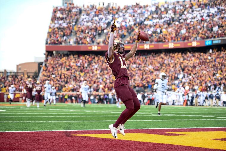 Minnesota Gophers wide receiver Rashod Bateman (13) celebrated his first quarter touchdown against Penn State.