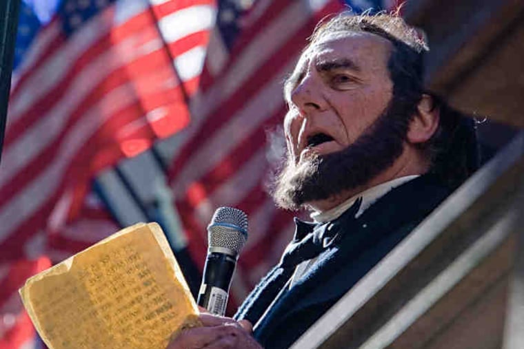 Christian Johnson of Cherry Hill as President Abraham Lincoln delivers the Gettysburg Address at the Union League in Philadelphia, where N.J. Gov. Christie received an award. Story, B6.