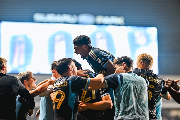 Union players swarmed Tai Baribo to celebrate together after his game-winning goal in the 96th minute.