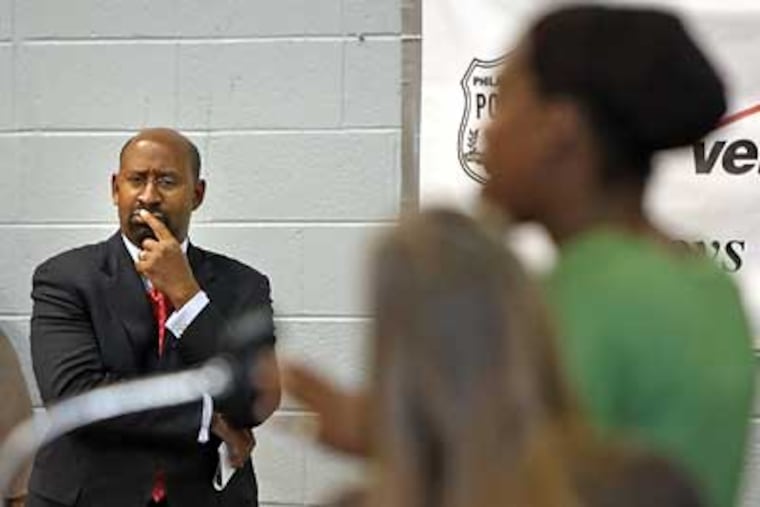 DHS first of four Town Hall meetings wih Mayor Michael Nutter listens to Nina Boyd-Williams, (in green) speak at the first of four DHS town hall meetings. (Steven M. Falk / Staff Photographer)