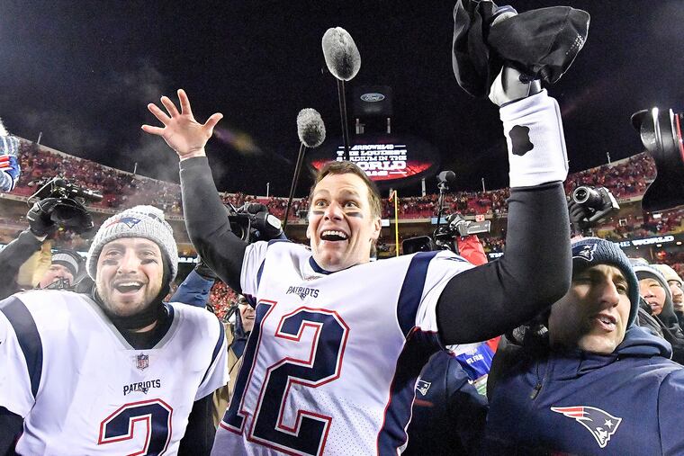 Tom Brady celebrates the Patriots' game-winning touchdown in overtime.