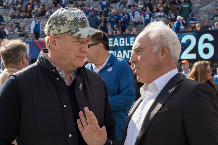 Eagles owner Jeffrey Lurie (right) and NFL Commissioner Roger Goodell talk before the game against the Giants at MetLife Stadium November 6, 2016. CLEM MURRAY / Staff Photographer
