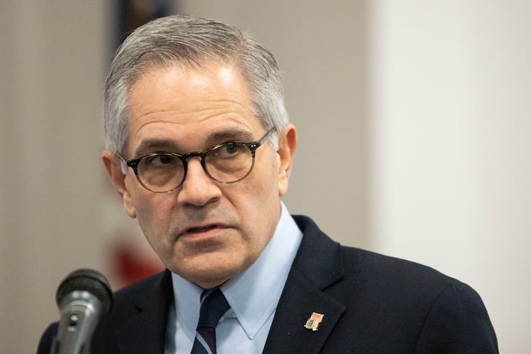 District Attorney Larry Krasner speaks at a news conference in this 2021 file photo.