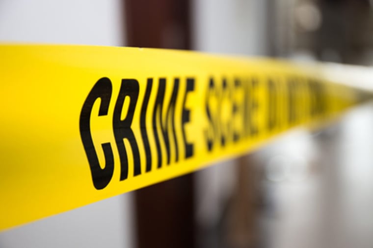Crime scene tape in building with blurred background (Dreamstime/TNS)