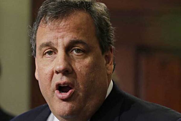 FILE - In this Dec. 19, 2013 file photo, New Jersey Gov. Chris Christie speaks Trenton, N.J. A North Jersey newspaper reports that emails it obtained show that a top aide to Christie at least had some involvement in the unexpected shutdown of lanes on the George Washington Bridge. (AP Photo/Mel Evans, File)