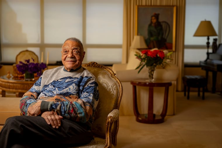 George E. Johnson Sr. sits in his Chicago home Tuesday, Feb. 18, 2025.