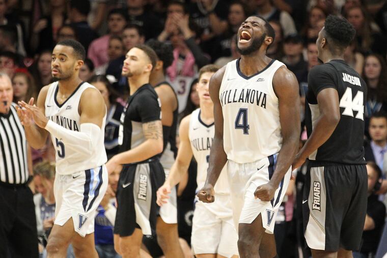 Eric Paschall, 2nd from right, of Villanova celebrates as Providence is forced to call a timeout late in the 2nd half at Finneran Pavilion on Feb. 13, 2019.