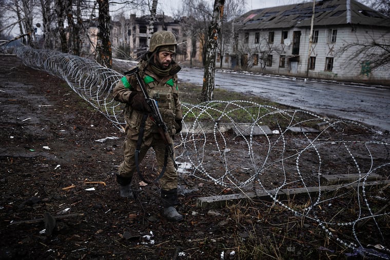 A Ukrainian soldier moves to a new position in Kostiantynivka, a city ravaged by drone warfare, in January.