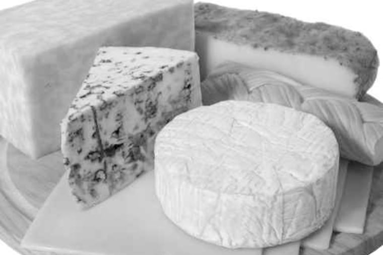 An assortment of cheeses is a simple appetizer. Add fruit, if you like.