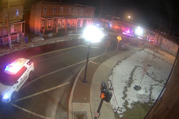 The Dodge Charger, seen in the upper-right corner, crashed into a support column underneath the the Interstate 676 highway on Pine Street in Camden, as seen in this still image from a street camera surveillance video.