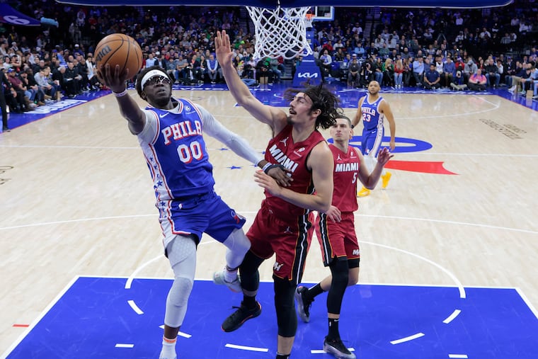 Reggie Jackson of the Sixers goes up for a shot against Jaime Jaquez of the Heat during the first half of their game at the Wells Fargo Center on Feb. 5, 2025.