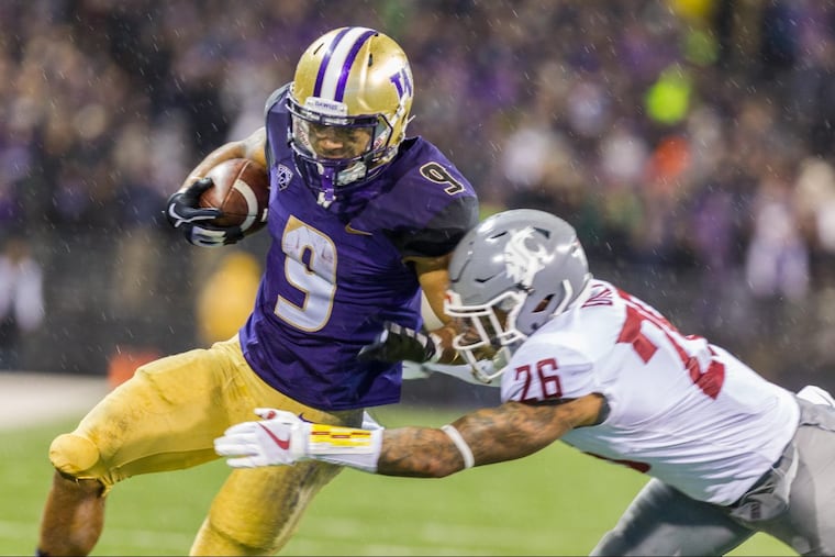 Myles Gaskin (9) is Washington’s leading rusher.