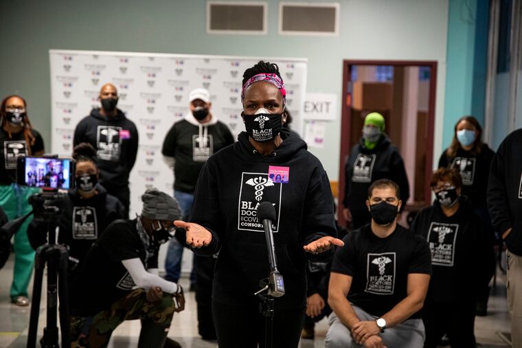 Doctor Ala Stanford, founder of the Black Doctors Covid Consortium, speaks to reporters after she was vaccinated last month.